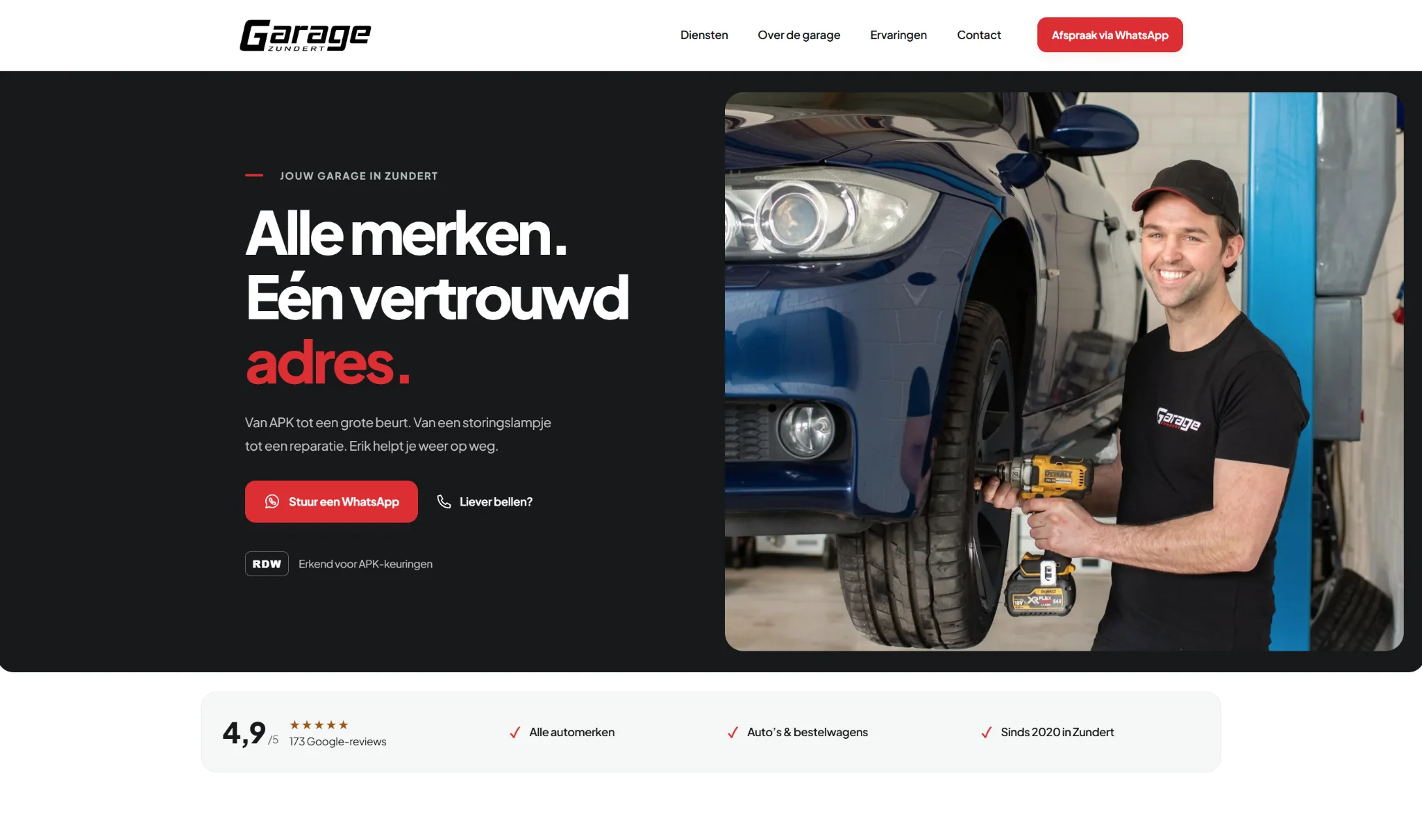 Homepage van Garage Zundert met donkere hero, rode accenten en foto van Erik in de werkplaats